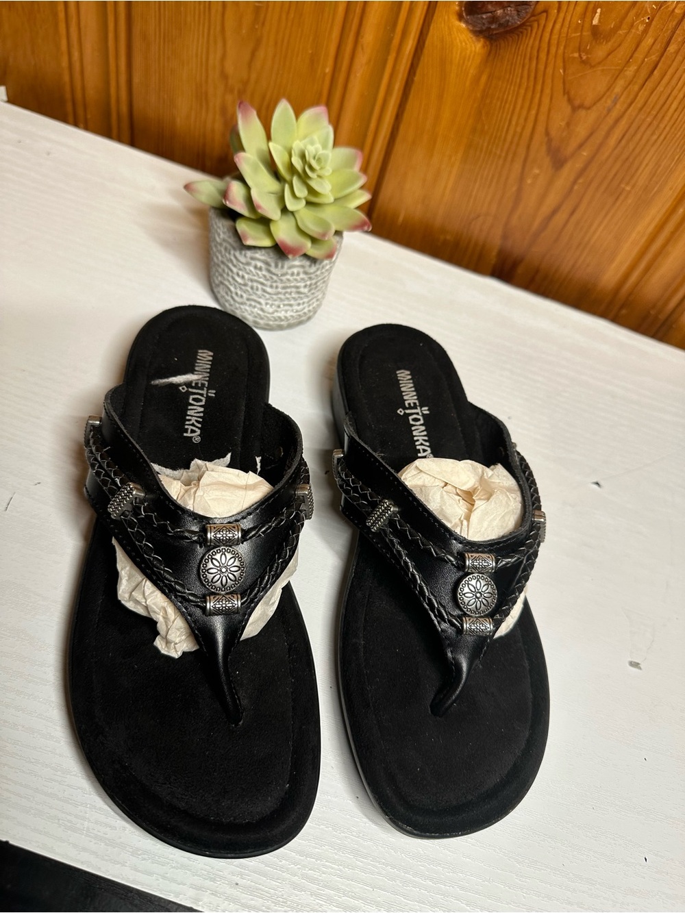 Minnetonka Black Braided Thong Sandals with Concho Accents